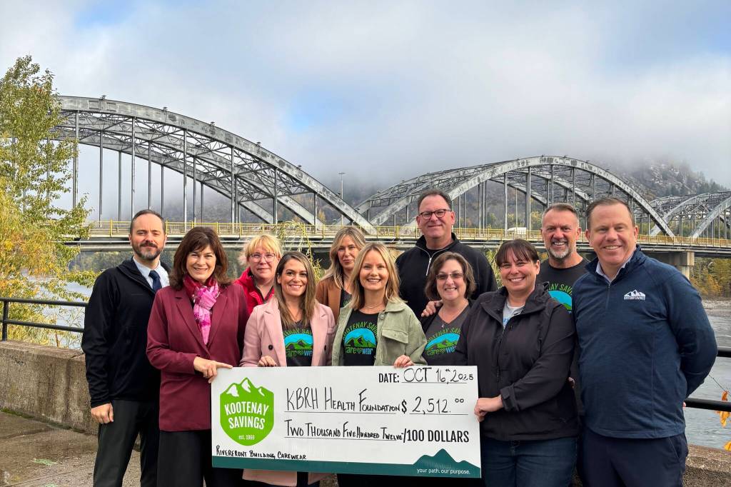 Kootenay Savings Credit Union staff in the Riverfront building have donated $2,512 to Mental Health Matters, in recognition of International Credit Union Day, held Oct. 16. L-R: Jeff Craig, board of KBRH: Lisa Pasin, executive director KBRH Health Foundation; and Lisa Babcock, KBRH board, gathered on the Trail esplanade alongside Kootenay Savings Credit Union Riverfront building staff including CEO Mark McLoughlin, Paul Butler, and Mike Bushore, Chief Risk Officer. (Submitted)